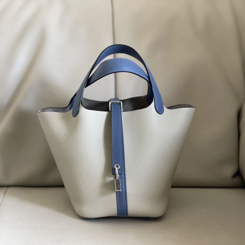 H**mes shopping bags